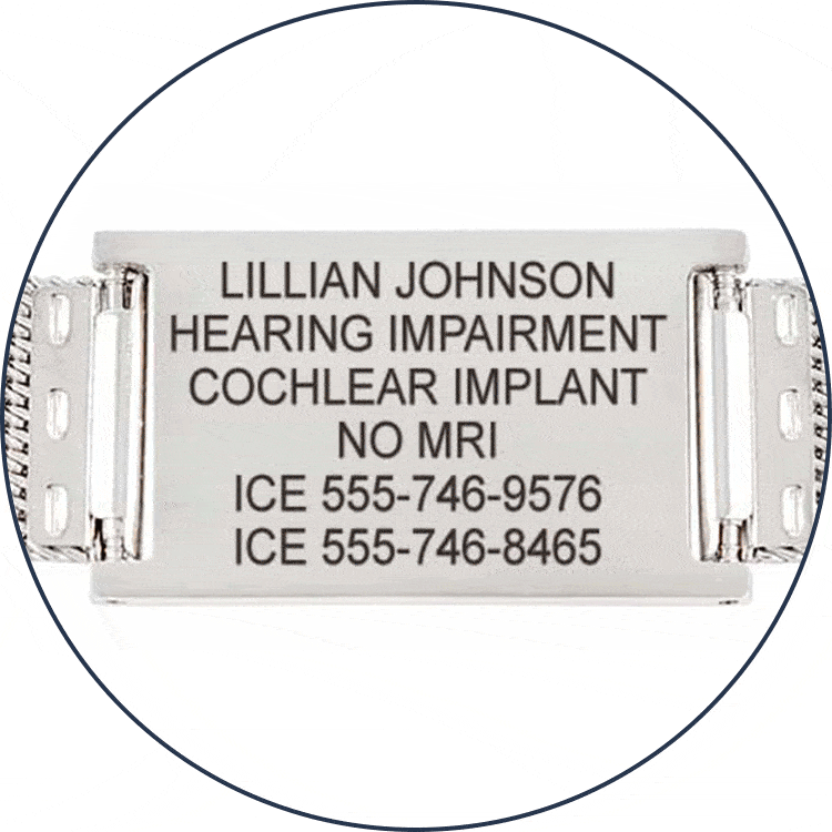 Medical ID tag being custom engraved with medical information in laser engraving