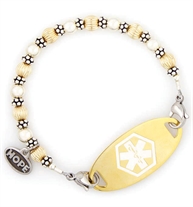 14 carat gold-filled and sterling silver beads interchangeable bracelet with stainless steel lobster clasps at each end attached to gold ID tag