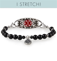Interchangeable black beaded bracelet with silver accents attached to floral medical ID tag